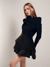 Mini-robe noire patchwork à sequins